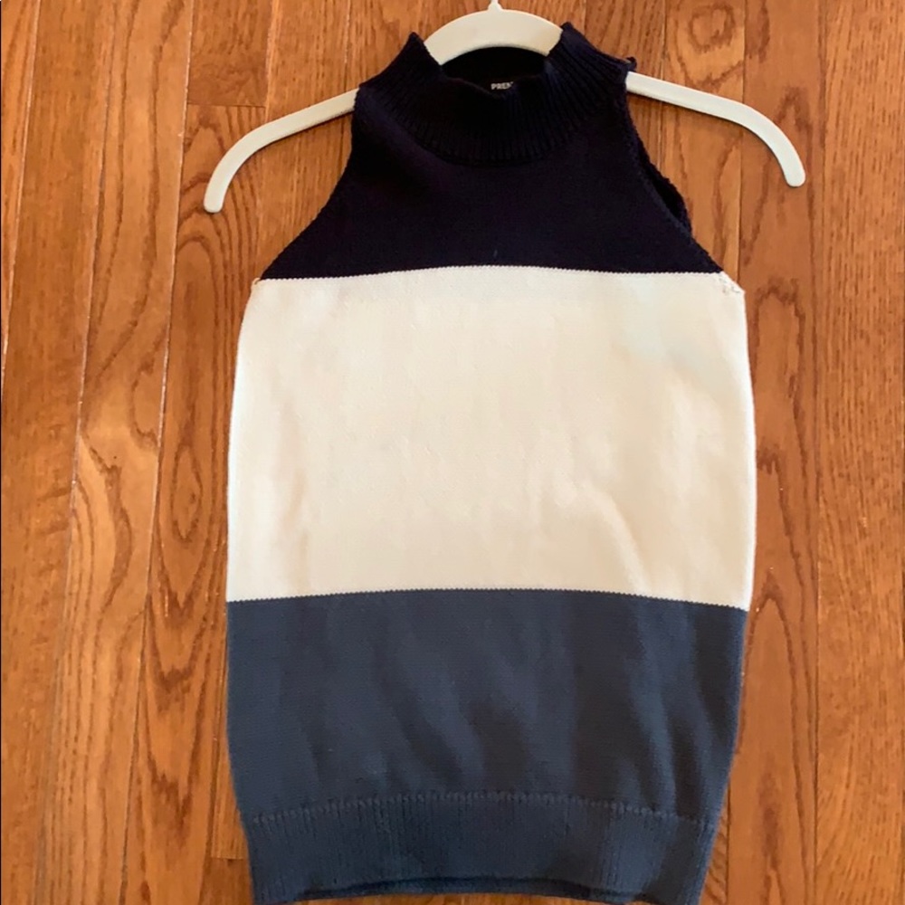 Mock, sleeveless turtleneck